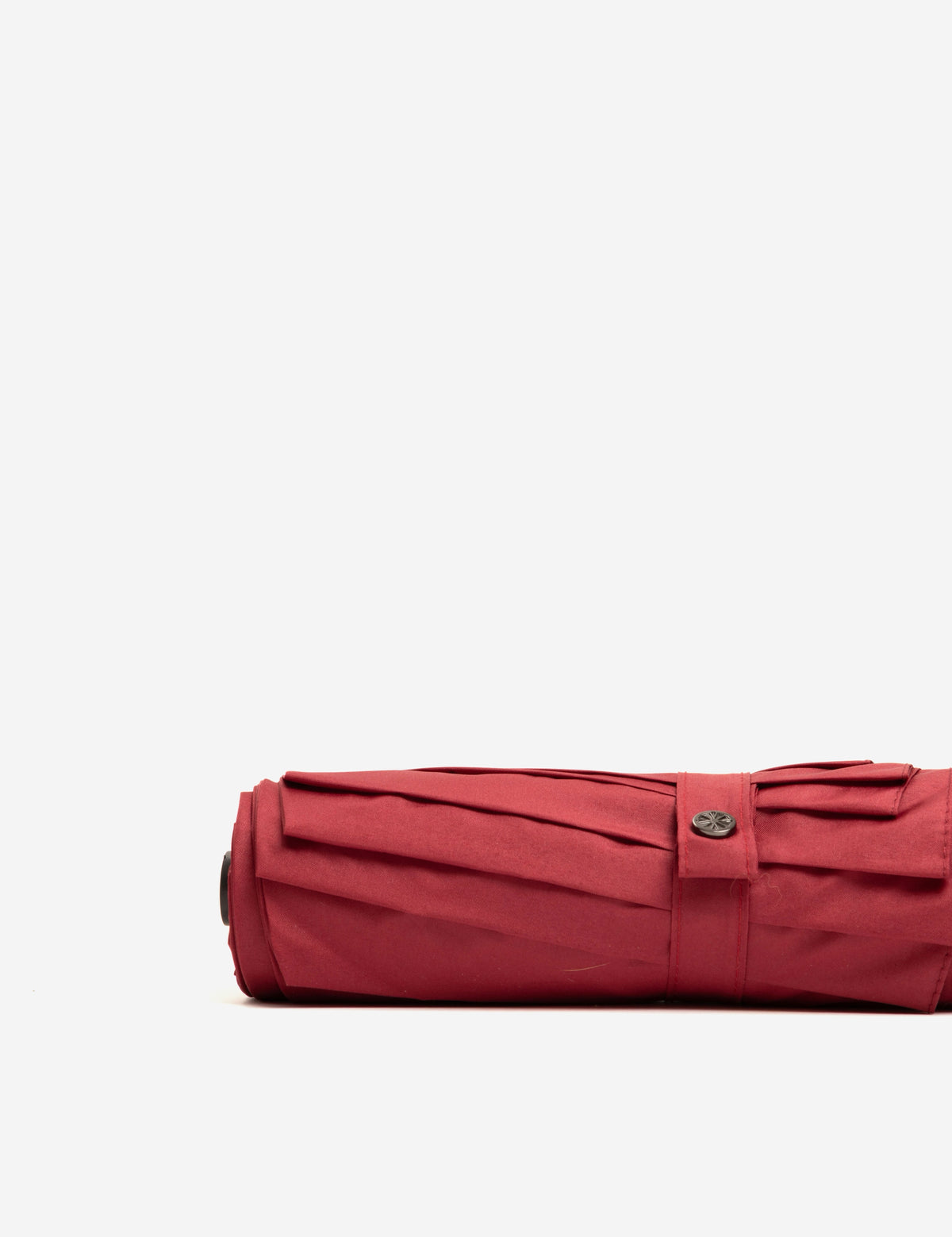 Druckknopf Detail eines roten Sapor Iconic Taschenschirms